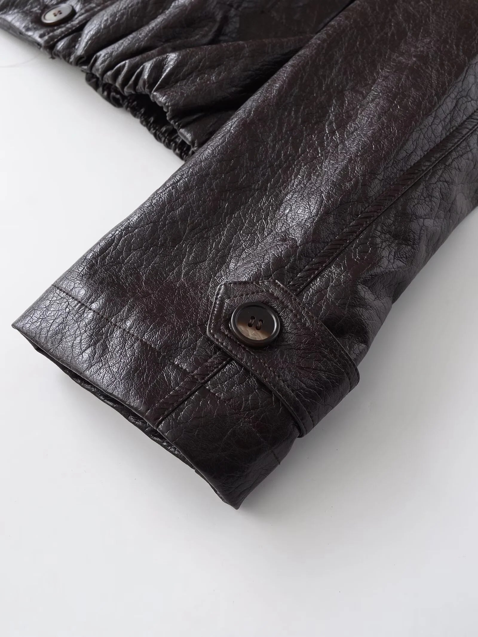 2025 Winter New Women's Casual Fashionable Simple Stand Collar Long Sleeve Leather Button Double-Breasted Loose Short Jacket